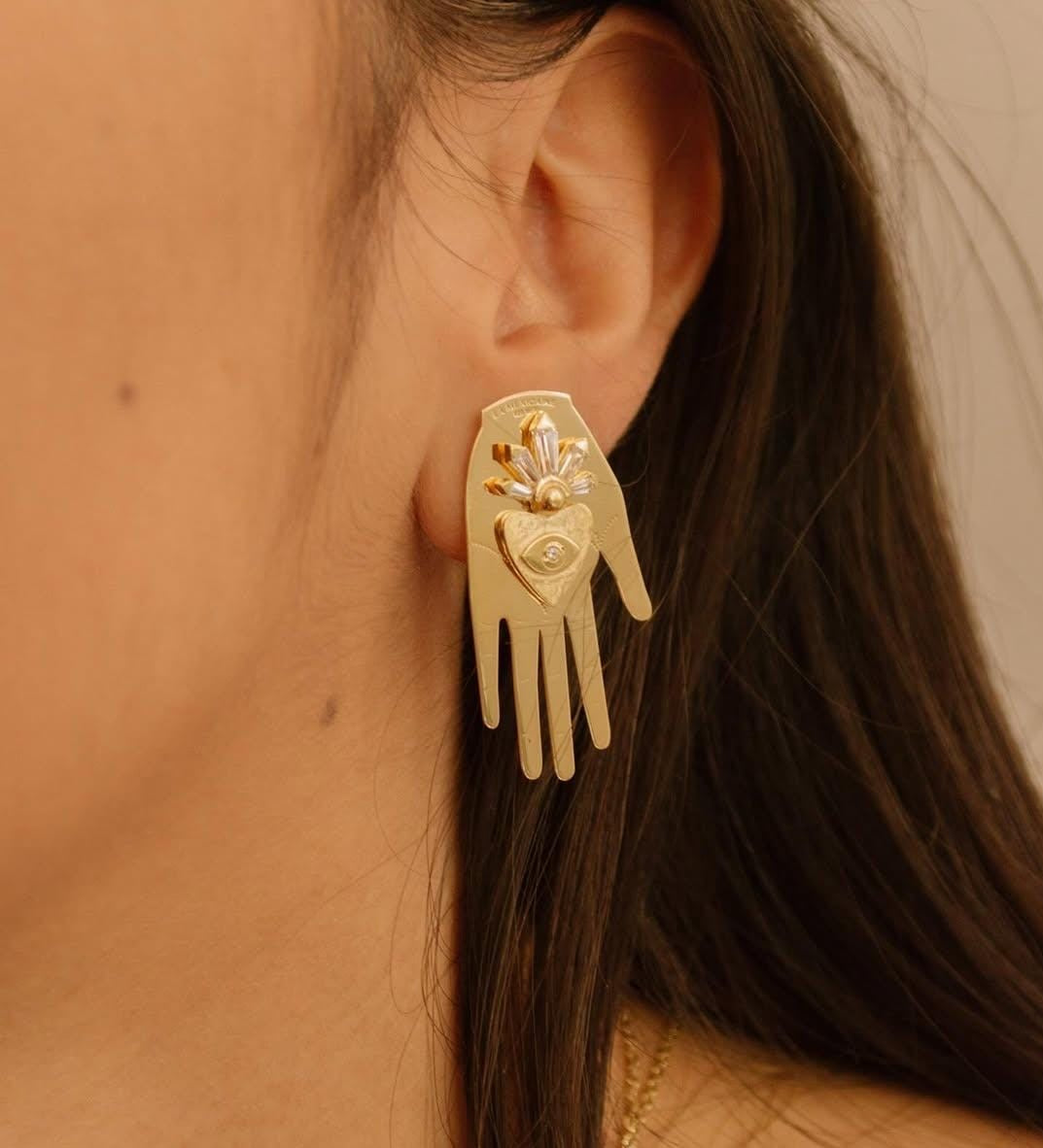 Arete Con El Corazón En La Mano